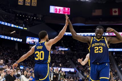 Dec 3, 2022; San Francisco, California, USA;  Golden State Warriors guard Stephen Curry (30) and forward Draymond Green (23) celebrate during the second half against the Houston Rockets at Chase Center. Mandatory Credit: John Hefti-USA TODAY Sports