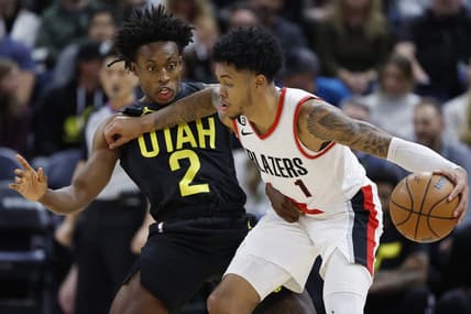 Dec 3, 2022; Salt Lake City, Utah, USA; Utah Jazz guard Collin Sexton (2) guards Portland Trail Blazers guard Anfernee Simons (1) in the second half at Vivint Arena. Mandatory Credit: Jeffrey Swinger-USA TODAY Sports