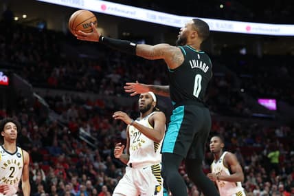 Dec 4, 2022; Portland, Oregon, USA;  Portland Trail Blazers guard Damian Lillard (0) shoots the ball over Indiana Pacers in the first half at Moda Center. Mandatory Credit: Jaime Valdez-USA TODAY Sports