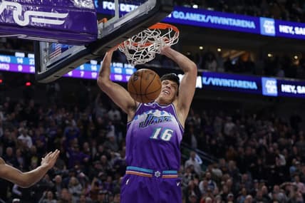 Dec 7, 2022; Salt Lake City, Utah, USA; Utah Jazz forward Simone Fontecchio (16) dunks the basketball to win the game 124-123 against the Golden State Warriors in the final seconds of the game at Vivint Arena. Mandatory Credit: Chris Nicoll-USA TODAY Sports