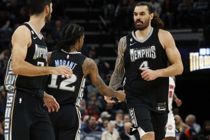 Dec 9, 2022; Memphis, Tennessee, USA; Memphis Grizzlies center Steven Adams (4) reacts with Memphis Grizzlies guard Ja Morant (12) during the first half against the Detroit Pistons at FedExForum. Mandatory Credit: Petre Thomas-USA TODAY Sports