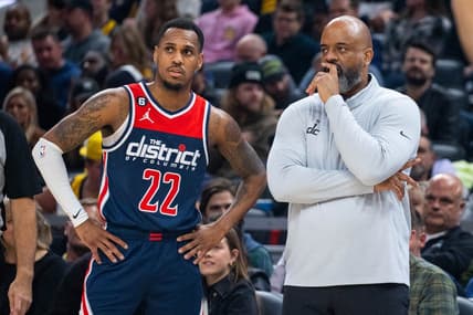 Dec 9, 2022; Indianapolis, Indiana, USA; Washington Wizards guard Monte Morris (22) and head coach Wes Unseld Jr. in the second half against the Indiana Pacers at Gainbridge Fieldhouse. Mandatory Credit: Trevor Ruszkowski-USA TODAY Sports