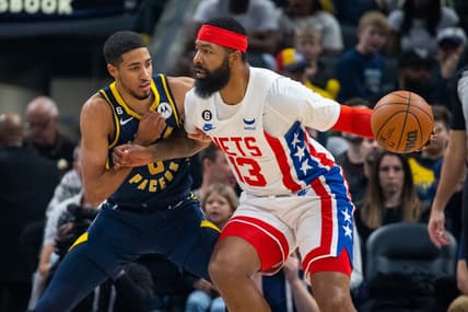 Dec 10, 2022; Indianapolis, Indiana, USA; Brooklyn Nets forward Markieff Morris (13) dribbles the ball against Indiana Pacers guard Tyrese Haliburton (0) in the first quarter at Gainbridge Fieldhouse. Mandatory Credit: Trevor Ruszkowski-USA TODAY Sports