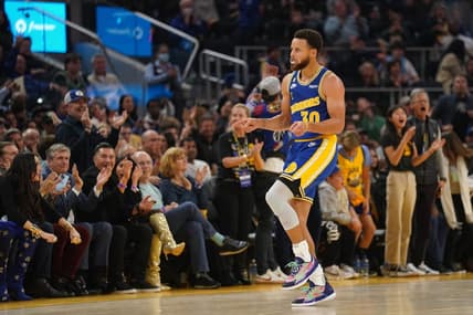 Dec 10, 2022; San Francisco, California, USA; Golden State Warriors guard Stephen Curry (30) celebrates after making a three point basket while being fouled against the Boston Celtics in the second quarter at the Chase Center. Mandatory Credit: Cary Edmondson-USA TODAY Sports