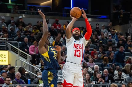 Dec 10, 2022; Indianapolis, Indiana, USA; Brooklyn Nets forward Markieff Morris (13) shoots the ball against Indiana Pacers forward Jalen Smith (25) in the second half at Gainbridge Fieldhouse. Mandatory Credit: Trevor Ruszkowski-USA TODAY Sports