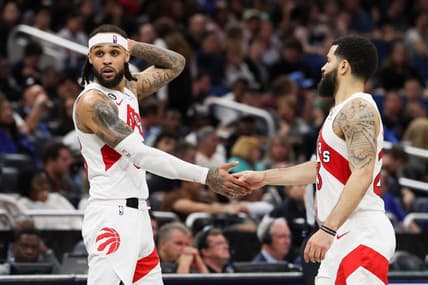 Dec 11, 2022; Orlando, Florida, USA;  Toronto Raptors guard Fred VanVleet (23) and guard Gary Trent Jr. (33) react after a play against the Orlando Magic in the third quarter at Amway Center. Mandatory Credit: Nathan Ray Seebeck-USA TODAY Sports