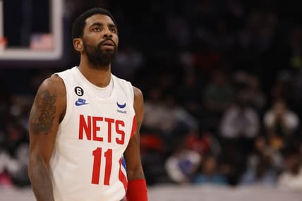 Dec 12, 2022; Washington, District of Columbia, USA; Brooklyn Nets guard Kyrie Irving (11) stands on the court against the Washington Wizards in the third quarter at Capital One Arena. Mandatory Credit: Geoff Burke-USA TODAY Sports
