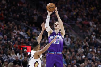 Dec 15, 2022; Salt Lake City, Utah, USA; Utah Jazz forward Lauri Markkanen (23) shoots over -New Orleans Pelicans guard CJ McCollum (3) in the first half at Vivint Arena. Mandatory Credit: Jeffrey Swinger-USA TODAY Sports