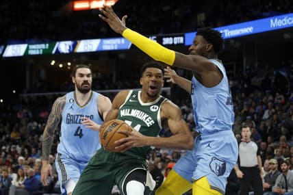 Dec 15, 2022; Memphis, Tennessee, USA; Milwaukee Bucks forward Giannis Antetokounmpo (34) drives to the basket as Memphis Grizzlies forward Jaren Jackson Jr. (13) defends during the second half at FedExForum. Mandatory Credit: Petre Thomas-USA TODAY Sports