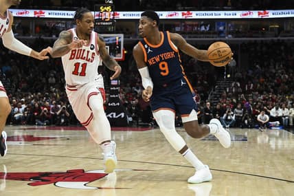 Dec 16, 2022; Chicago, Illinois, USA;  New York Knicks guard RJ Barrett (9) dribbles past Chicago Bulls forward DeMar DeRozan (11) during the second half at the United Center. Mandatory Credit: Matt Marton-USA TODAY Sports