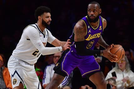 Dec 16, 2022; Los Angeles, California, USA; Los Angeles Lakers forward LeBron James (6) controls the ball against Denver Nuggets guard Jamal Murray (27)  during the first half at Crypto.com Arena. Mandatory Credit: Gary A. Vasquez-USA TODAY Sports