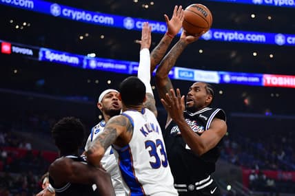 Dec 17, 2022; Los Angeles, California, USA; Los Angeles Clippers forward Kawhi Leonard (2) shoots against the Washington Wizards during the first half at Crypto.com Arena. Mandatory Credit: Gary A. Vasquez-USA TODAY Sports