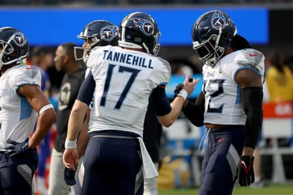 Dec 18, 2022; Inglewood, California, USA;  Tennessee Titans quarterback Ryan Tannehill (17) and running back Derrick Henry (22) shake hands before the game against the Los Angeles Chargersat SoFi Stadium. Mandatory Credit: Kiyoshi Mio-USA TODAY Sports