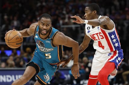 Dec 18, 2022; Detroit, Michigan, USA; Detroit Pistons guard Alec Burks (5) dribbles defended by Brooklyn Nets guard Edmond Sumner (4) in the first half at Little Caesars Arena. Mandatory Credit: Rick Osentoski-USA TODAY Sports