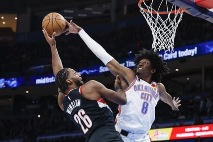 Dec 19, 2022; Oklahoma City, Oklahoma, USA; Oklahoma City Thunder forward Jalen Williams (8) blocks a shot by Portland Trail Blazers forward Justise Winslow (26) during the second quarter at Paycom Center. Mandatory Credit: Alonzo Adams-USA TODAY Sports