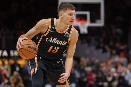 Dec 19, 2022; Atlanta, Georgia, USA; Atlanta Hawks guard Bogdan Bogdanovic (13) dribbles against the Orlando Magic in the second half at State Farm Arena. Mandatory Credit: Brett Davis-USA TODAY Sports