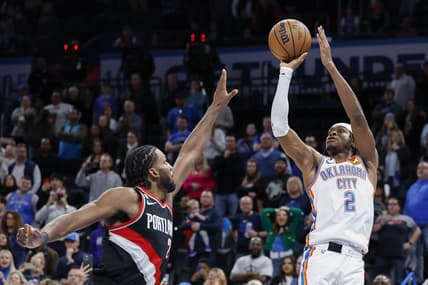 Dec 19, 2022; Oklahoma City, Oklahoma, USA; Oklahoma City Thunder guard Shai Gilgeous-Alexander (2) shoots the game winning shot against Portland Trail Blazers forward Justise Winslow (26) during the second half at Paycom Center. Oklahoma City won 123-121. Mandatory Credit: Alonzo Adams-USA TODAY Sports
