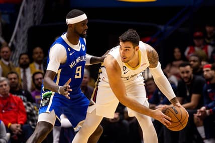 Dec 19, 2022; New Orleans, Louisiana, USA; New Orleans Pelicans center Willy Hernangomez (9) looks to pass the ball against Milwaukee Bucks forward Bobby Portis (9) during the second half at Smoothie King Center. Mandatory Credit: Stephen Lew-USA TODAY Sports