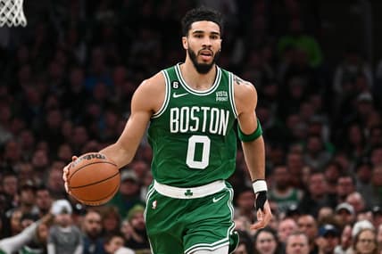 Dec 21, 2022; Boston, Massachusetts, USA; Boston Celtics forward Jayson Tatum (0) dribbles the ball against the Indiana Pacers during the third quarter at the TD Garden. Mandatory Credit: Brian Fluharty-USA TODAY Sports
