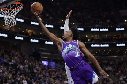 Dec 22, 2022; Salt Lake City, Utah, USA;  Utah Jazz guard Collin Sexton (2) gets past Washington Wizards guard Monte Morris (22) and to the basket during the first quarter at Vivint Arena. Mandatory Credit: Chris Nicoll-USA TODAY Sports