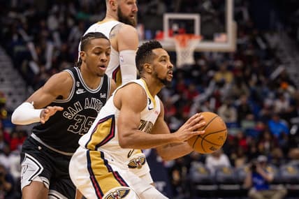 Dec 22, 2022; New Orleans, Louisiana, USA; New Orleans Pelicans guard CJ McCollum (3) shoots a jump shot against San Antonio Spurs guard Romeo Langford (35) during the second half at Smoothie King Center. Mandatory Credit: Stephen Lew-USA TODAY Sports