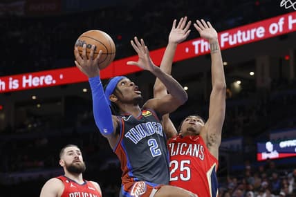 Dec 23, 2022; Oklahoma City, Oklahoma, USA; Oklahoma City Thunder guard Shai Gilgeous-Alexander (2) shoots as New Orleans Pelicans guard Trey Murphy III (25) defends during the second quarter at Paycom Center. Mandatory Credit: Alonzo Adams-USA TODAY Sports