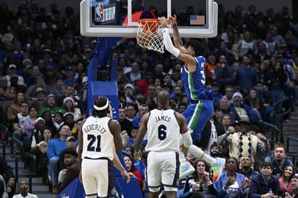 Dec 25, 2022; Dallas, Texas, USA; Dallas Mavericks forward Christian Wood (35) dunks the ball as Los Angeles Lakers guard Patrick Beverley (21) and forward LeBron James (6) look on during the second half at the American Airlines Center. Mandatory Credit: Jerome Miron-USA TODAY Sports