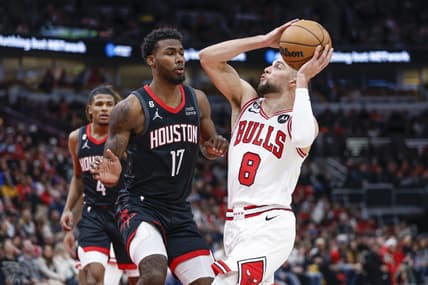 Dec 26, 2022; Chicago, Illinois, USA; Chicago Bulls guard Zach LaVine (8) drives to the basket against Houston Rockets forward Tari Eason (17) during the first half at United Center. Mandatory Credit: Kamil Krzaczynski-USA TODAY Sports