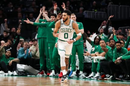 Dec 27, 2022; Boston, Massachusetts, USA; Boston Celtics forward Jayson Tatum (0) reacts after making a three point shot during the first half against the Houston Rockets at TD Garden. Mandatory Credit: Paul Rutherford-USA TODAY Sports