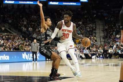 Dec 29, 2022; San Antonio, Texas, USA; New York Knicks forward Julius Randle (30) drives to the basket against San Antonio Spurs guard Tre Jones (33) during the second half  at AT&T Center. Mandatory Credit: Scott Wachter-USA TODAY Sports
