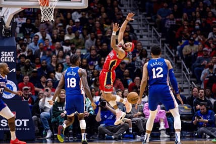Dec 30, 2022; New Orleans, Louisiana, USA; New Orleans Pelicans guard Jose Alvarado (15) reacts after being fouled by Philadelphia 76ers guard Shake Milton (18) during the first half at Smoothie King Center. Mandatory Credit: Stephen Lew-USA TODAY Sports