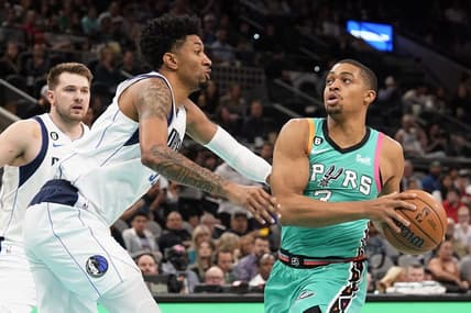 Dec 31, 2022; San Antonio, Texas, USA; San Antonio Spurs forward Keldon Johnson (3) drives to the basket against Dallas Mavericks center Christian Wood (35) during the first half at AT&T Center. Mandatory Credit: Scott Wachter-USA TODAY Sports