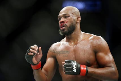 Feb 8, 2020; Houston, Texas, USA; Jon Jones (red gloves) fights Dominick Reyes (not pictured) during UFC 247 at Toyota Center. Mandatory Credit: Thomas Shea-USA TODAY Sports