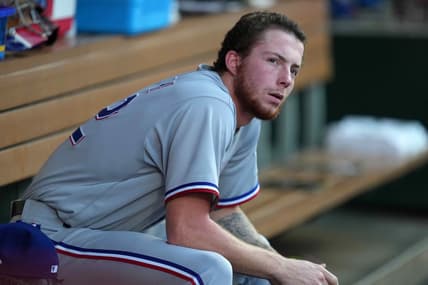 Sep 6, 2021; Anaheim, California, USA;  Texas Rangers starting pitcher A.J. Alexy (62) watches from the dugout in the second inning against the Los Angeles Angels at Angel Stadium. Mandatory Credit: Kirby Lee-USA TODAY Sports