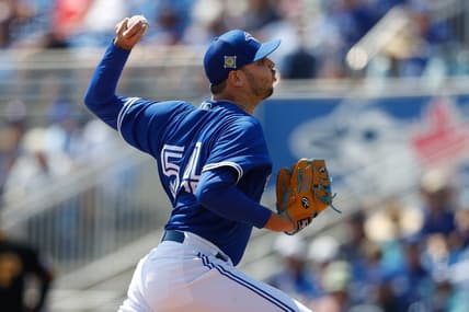 Mar 20, 2022; Dunedin, Florida, USA; Toronto Blue Jays pitcher Tayler Saucedo (54) throws a pitch in the third inning against the Pittsburgh Pirates during spring training at TD Ballpark. Mandatory Credit: Nathan Ray Seebeck-USA TODAY Sports