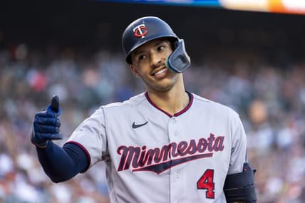 Jul 23, 2022; Detroit, Michigan, USA; Minnesota Twins shortstop Carlos Correa (4) smiles and gives a fan a thumbs up during the seventh inning in a game against the Detroit Tigers at Comerica Park. Mandatory Credit: Raj Mehta-USA TODAY Sports