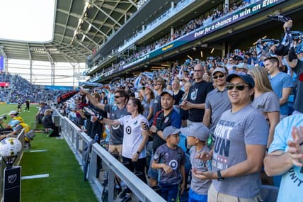 Sep 3, 2022; Saint Paul, Minnesota, USA; Minnesota United fans wave their scarves as their team has a corner kick in the first half against FC Dallas at Allianz Field. Mandatory Credit: Matt Blewett-USA TODAY Sports