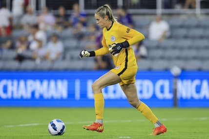 Sep 16, 2022; Louisville, Kentucky, USA; Racing Louisville FC goalkeeper Katie Lund (1) dribbles against Orlando Pride in the first half at Lynn Family Stadium. Mandatory Credit: Aaron Doster-USA TODAY Sports