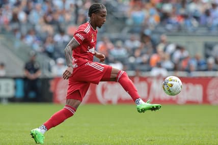 Sep 17, 2022; New York, New York, USA; New York Red Bulls defender Kyle Duncan (6) plays the ball against New York City FC during the second half at Yankee Stadium. Mandatory Credit: Vincent Carchietta-USA TODAY Sports