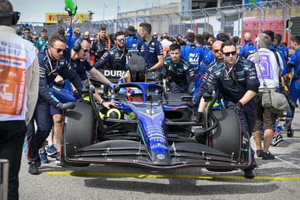 Oct 23, 2022; Austin, Texas, USA; The crew of Williams Racing driver Nicholas Latifi (6) of Team Canada wheel their car onto the grid before the start of the U.S. Grand Prix F1 race at Circuit of the Americas. Mandatory Credit: Jerome Miron-USA TODAY Sports