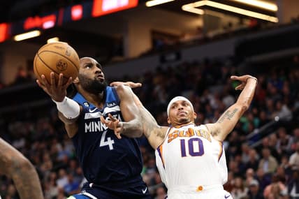 Nov 9, 2022; Minneapolis, Minnesota, USA; Minnesota Timberwolves guard Jaylen Nowell (4) shoots the ball while Phoenix Suns guard Damion Lee (10) defends during the second quarter at Target Center. Mandatory Credit: Matt Krohn-USA TODAY Sports