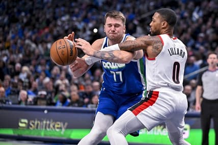 Nov 12, 2022; Dallas, Texas, USA; Dallas Mavericks guard Luka Doncic (77) and Portland Trail Blazers guard Damian Lillard (0) in action during the game between the Dallas Mavericks and the Portland Trail Blazers at the American Airlines Center. Mandatory Credit: Jerome Miron-USA TODAY Sports