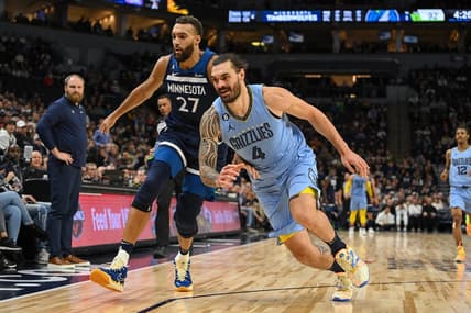 Nov 30, 2022; Minneapolis, Minnesota, USA;  Minnesota Timberwolves center Rudy Gobert (27) and Memphis Grizzlies center Steven Adams (4) race after a loose ball during the fourth quarter at Target Center. Mandatory Credit: Nick Wosika-USA TODAY Sports