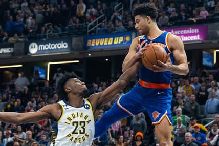 Dec 18, 2022; Indianapolis, Indiana, USA; Indiana Pacers forward Aaron Nesmith (23) and New York Knicks guard Quentin Grimes (6) go for a rebound in the second half at Gainbridge Fieldhouse. Mandatory Credit: Trevor Ruszkowski-USA TODAY Sports