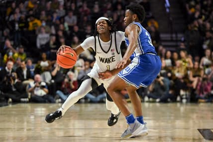 Dec 20, 2022; Winston-Salem, North Carolina, USA; Wake Forest Demon Deacons guard Tyree Appleby (1) is checked by Duke Blue Devils guard Jeremy Roach (3) during the second half at Lawrence Joel Veterans Memorial Coliseum. Mandatory Credit: William Howard-USA TODAY Sports