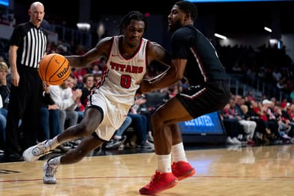 Detroit Mercy Titans guard Antoine Davis (0) drives on Cincinnati Bearcats guard David DeJulius (5) in the second half of the NCAA men   s basketball game at Fifth Third Arena in Cincinnati on Wednesday, Dec. 21, 2022. Cincinnati Bearcats defeated Detroit Mercy Titans 72-54.

Ncaa Basketball Detroit Mercy Titans At Cincinnati Bearcats