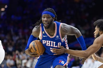 Dec 21, 2022; Philadelphia, Pennsylvania, USA; Philadelphia 76ers center Montrezl Harrell (5) drives with the ball against Detroit Pistons forward Marvin Bagley III (35) during the third quarter at Wells Fargo Center. Mandatory Credit: Bill Streicher-USA TODAY Sports