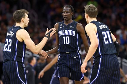 Dec 27, 2022; Orlando, Florida, USA; Orlando Magic forward Bol Bol (10) is congratulated by forward Franz Wagner (22) and center Moritz Wagner (21) against the Los Angeles Lakers during the second half at Amway Center. Mandatory Credit: Kim Klement-USA TODAY Sports
