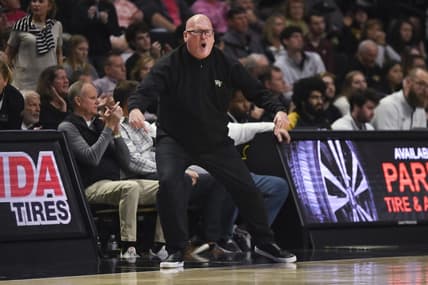 Dec 31, 2022; Winston-Salem, North Carolina, USA; Wake Forest Demon Deacons head coach Steve Forbes cheers on the team against the Virginia Tech Hokies during the second half at Lawrence Joel Veterans Memorial Coliseum. Mandatory Credit: William Howard-USA TODAY Sports
