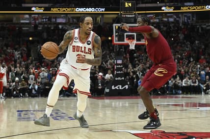 Dec 31, 2022; Chicago, Illinois, USA;  Chicago Bulls forward DeMar DeRozan (11) dribbles the ball against Cleveland Cavaliers guard Caris LeVert (3) during the second half at United Center. Mandatory Credit: Matt Marton-USA TODAY Sports